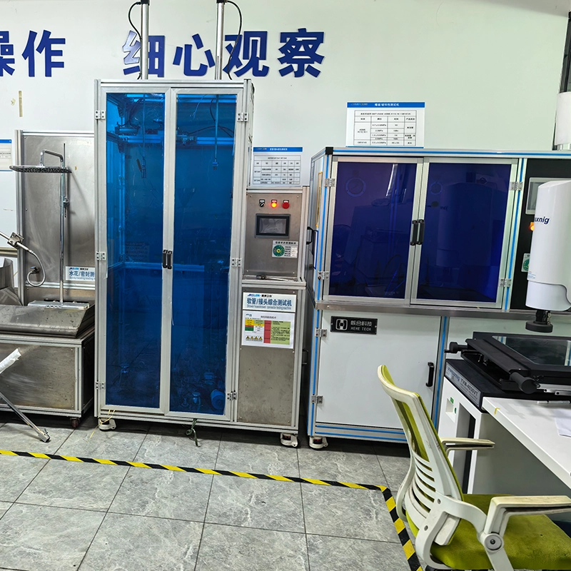 Burst and destructive testing machine used to verify shower hose pressure ratings per ASME A112.18.1