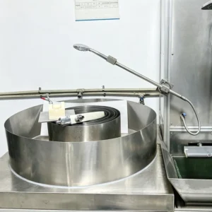 Handheld shower head mounted on hose bending durability test machine in JEKARE quality lab