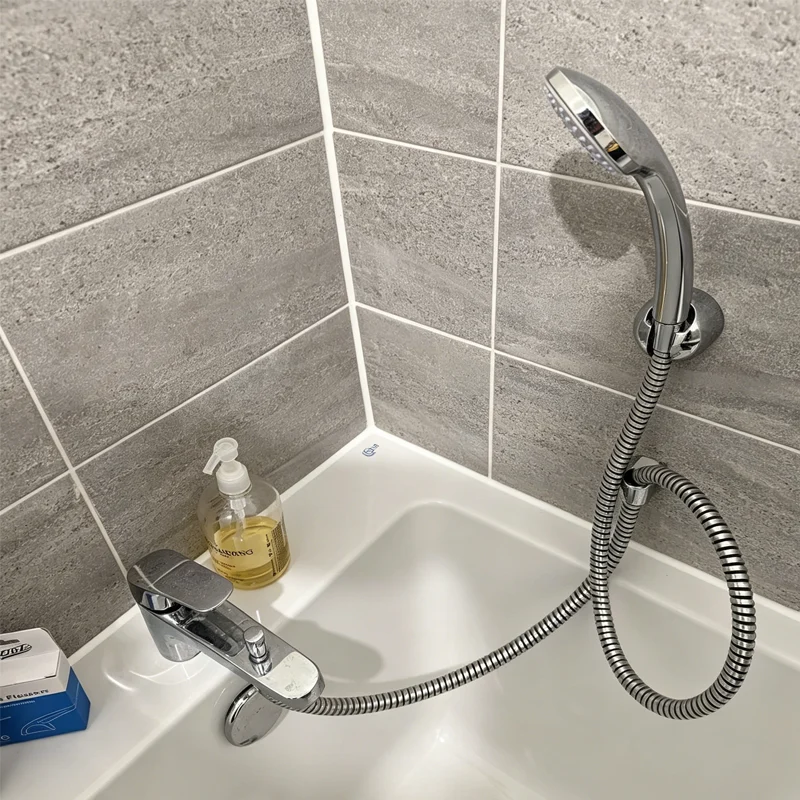 black shower head and hose