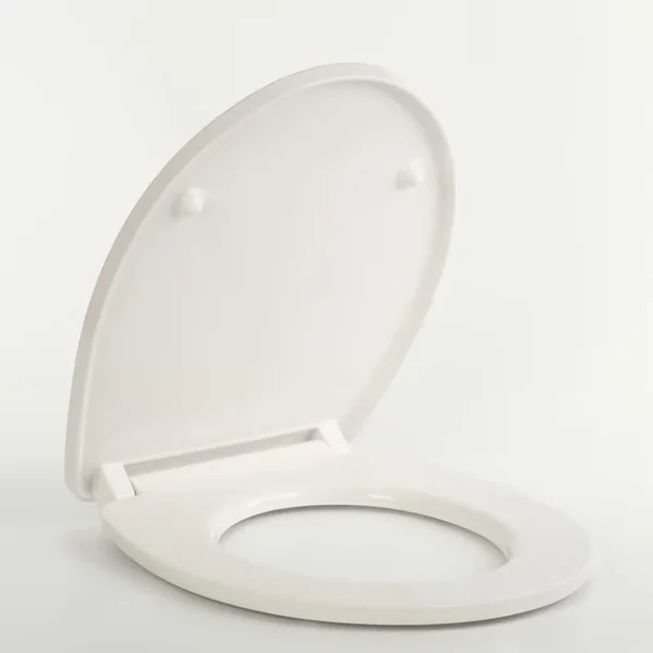 Automated surface grinding and non-porous polishing for Duroplast toilet seat components
