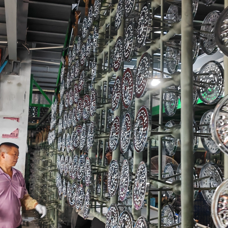 Workers Unloading Finished Electroplated Parts from Plating Rack