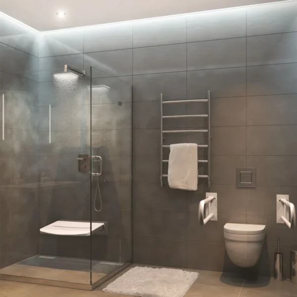 Accessible bathroom shower with grab bars and fold-down seat