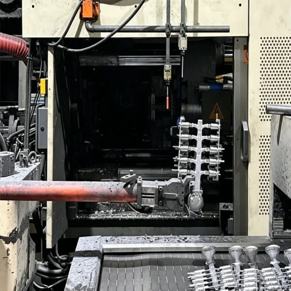 Jekare die casting machine producing brass bathroom fixture components