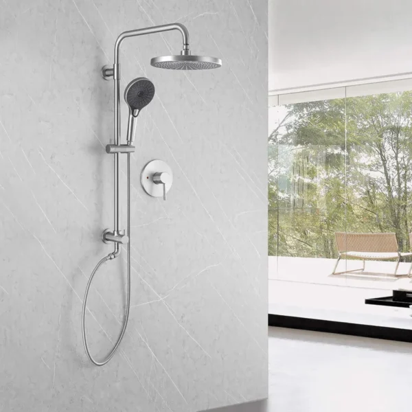Wall‑mounted complete shower system with overhead rainfall shower and handheld sprayer in modern bathroom