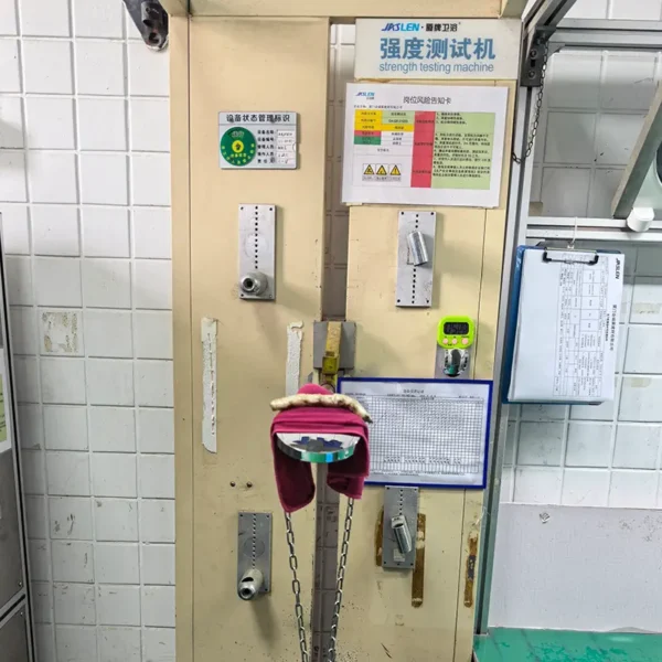 Factory strength testing machine for faucet accessories, durability load test equipment in sanitary ware workshop