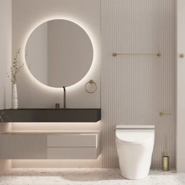 Contemporary neutral‑toned bathroom interior with smart toilet, gold brass bathroom accessories and lighted mirror